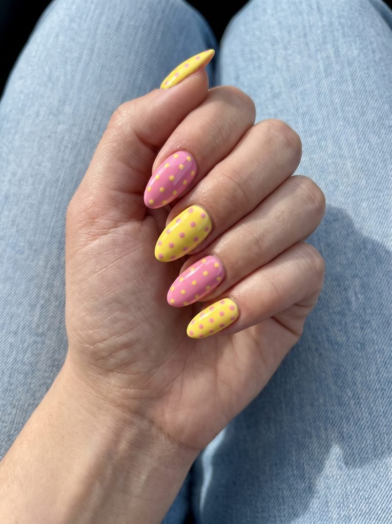Almond pink yellow polka dot nails