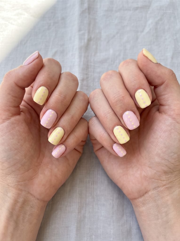 Baby pink yellow polka dot nails