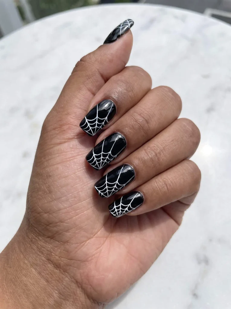 Black Nails With White Spiderweb Art