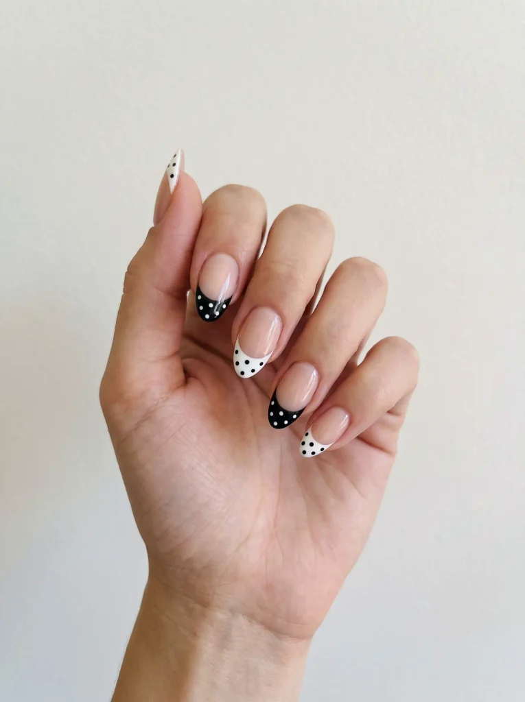 Black and white polka dot french nails