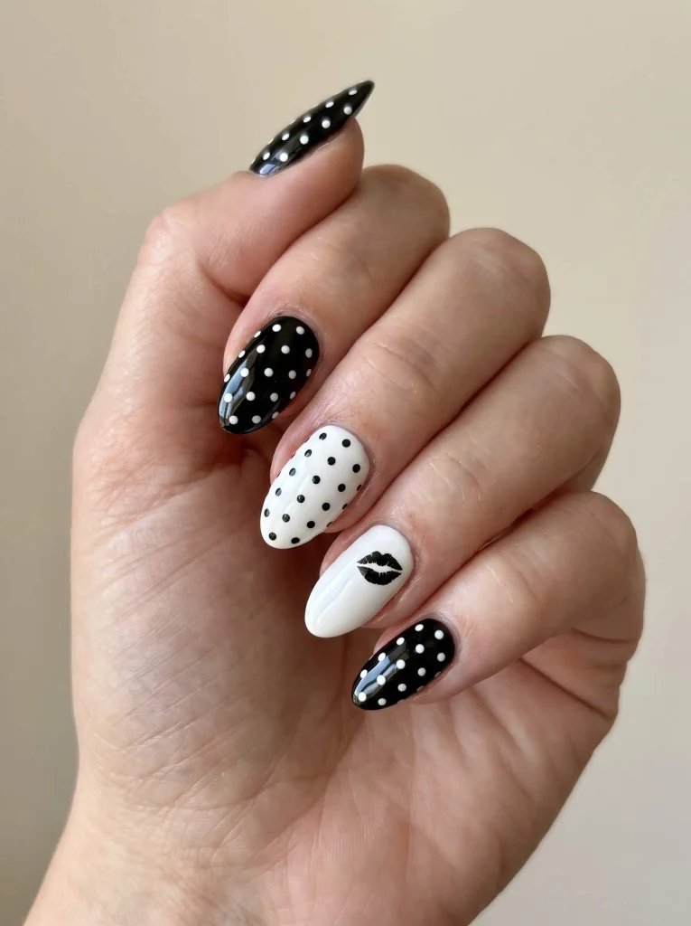 Black and white polka dot kiss nails