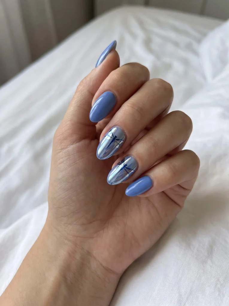 Blue chrome almond dragonfly nails