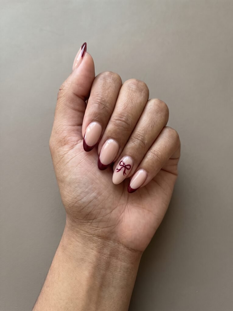 Burgundy Bow French Almond Nails