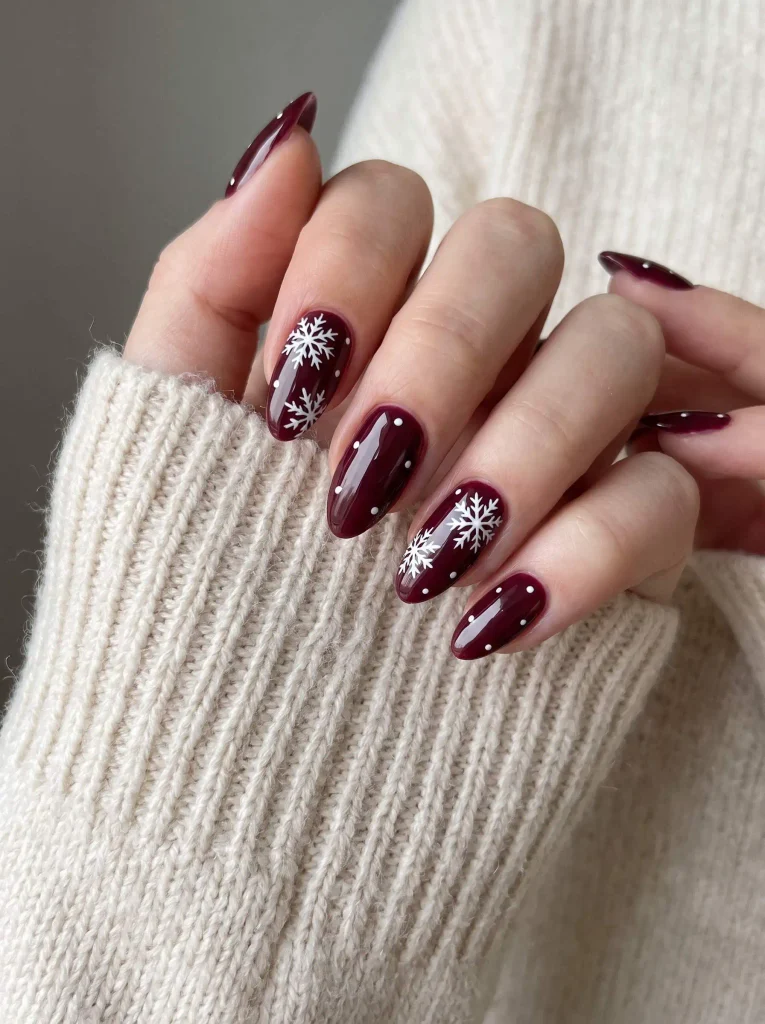 Burgundy Snowflake Almond Winter Nails