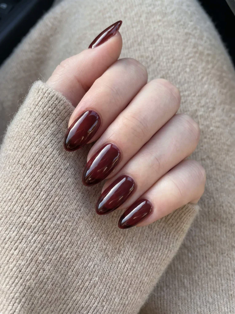 Burgundy glossy almond nails
