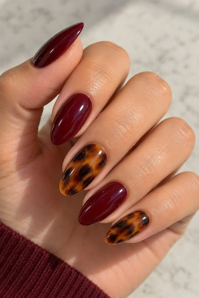 Burgundy tortoise shell nails