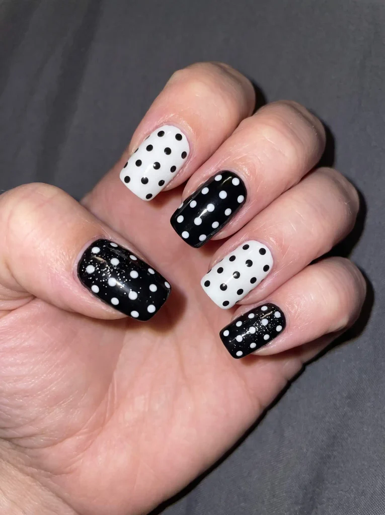 Glitter black and white polka dot nails
