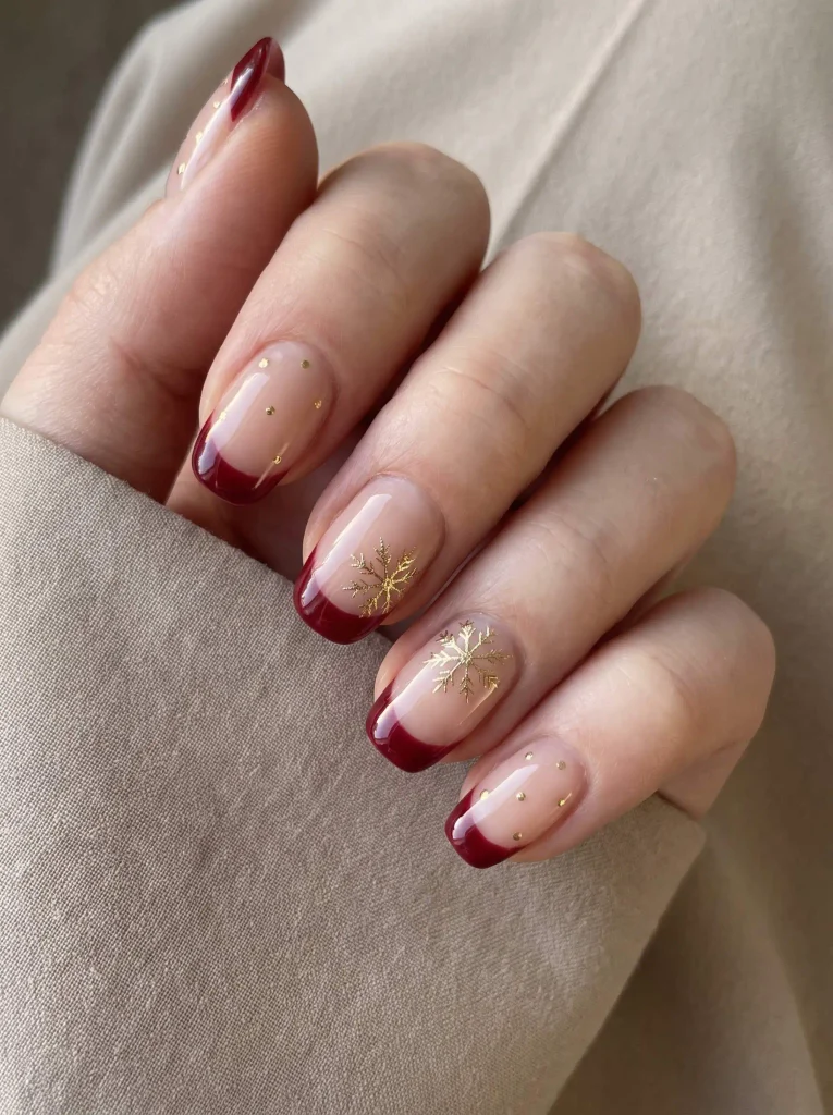 Gold Snowflake Nails with Red French Tips