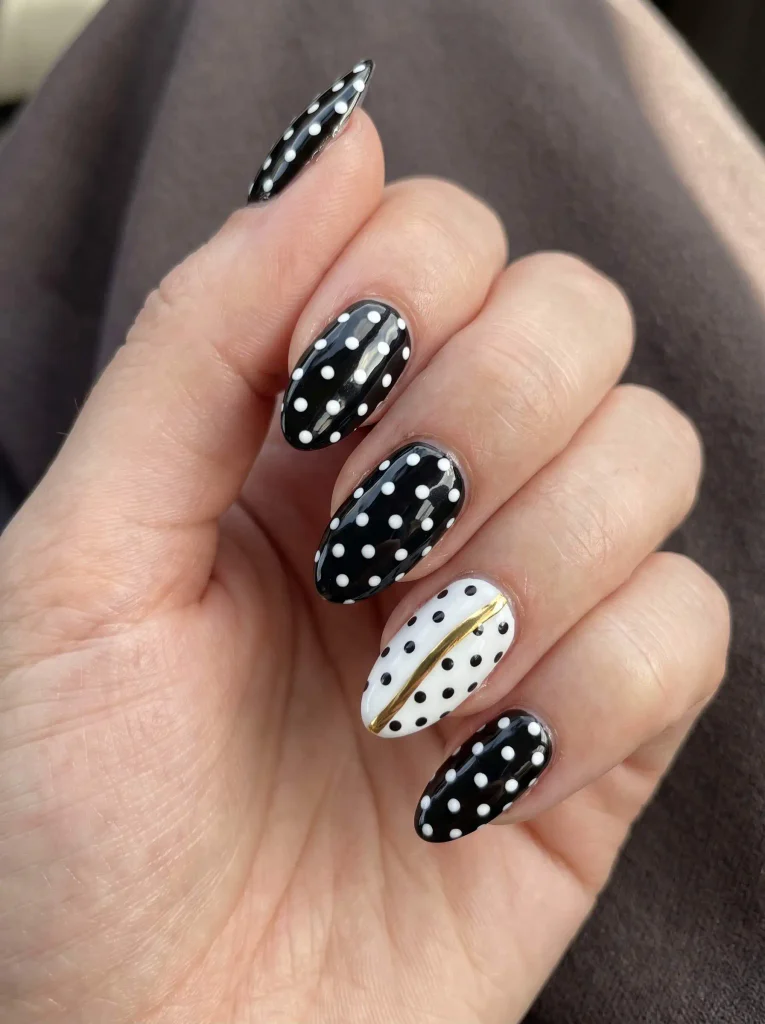 Gold black and white polka dot nails