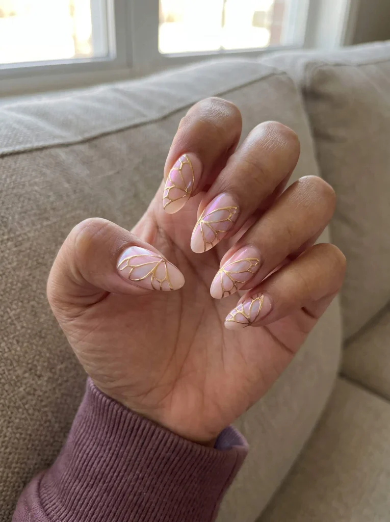 Gold outline butterfly wing nails