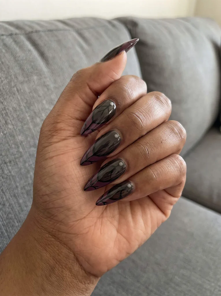 Goth butterfly wing stiletto nails