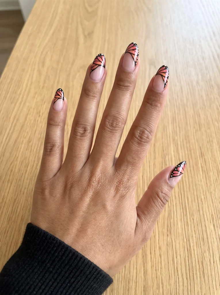Half wing butterfly nail design
