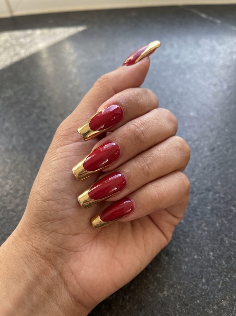 Long Red and Gold Acrylic Nails