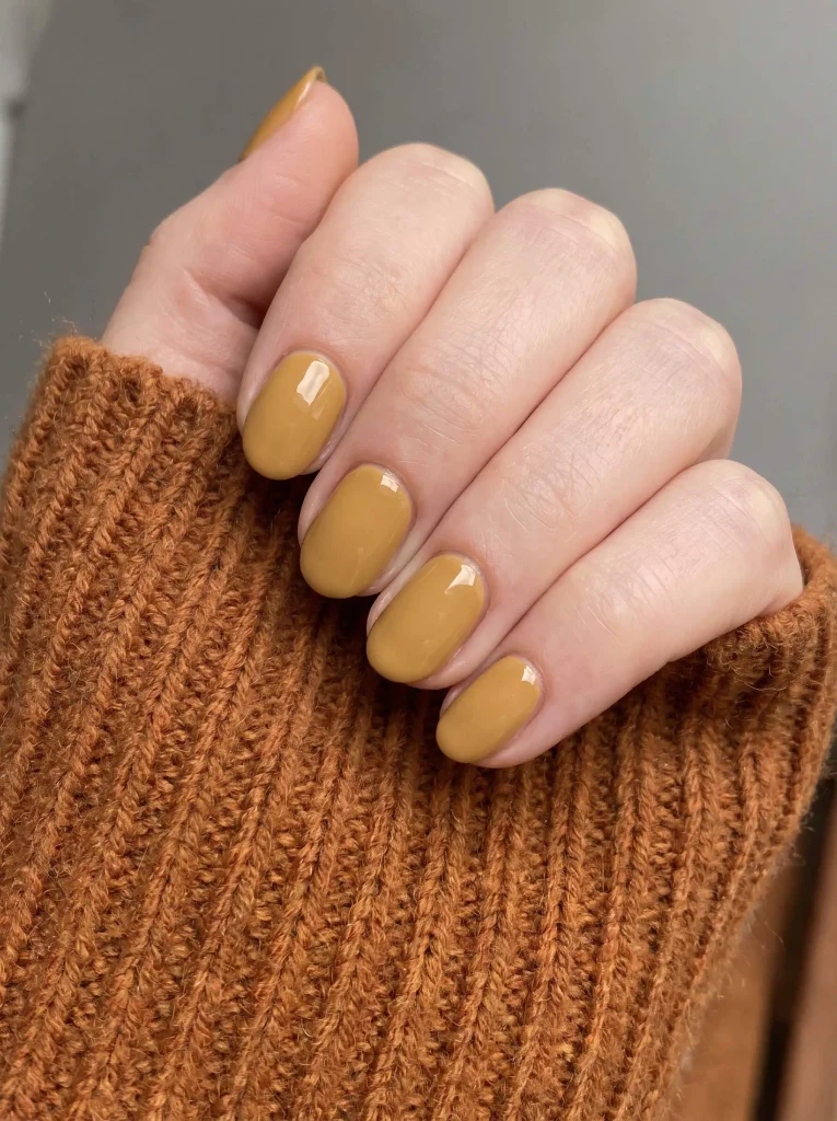 Mustard yellow short oval nails