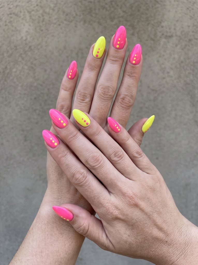 Neon pink and yellow dot nails