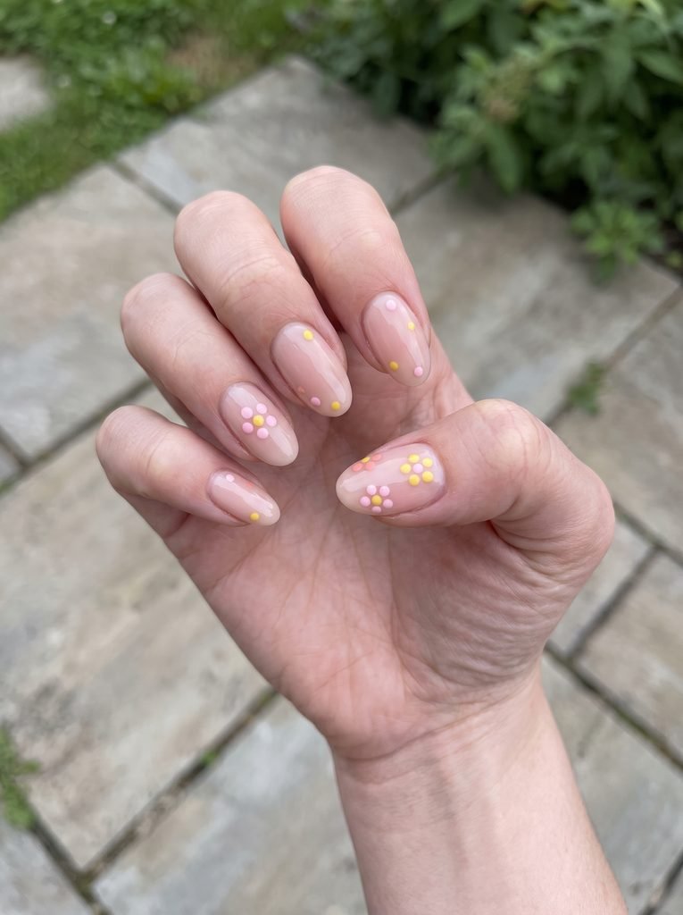 Pink yellow polka dot flower nails