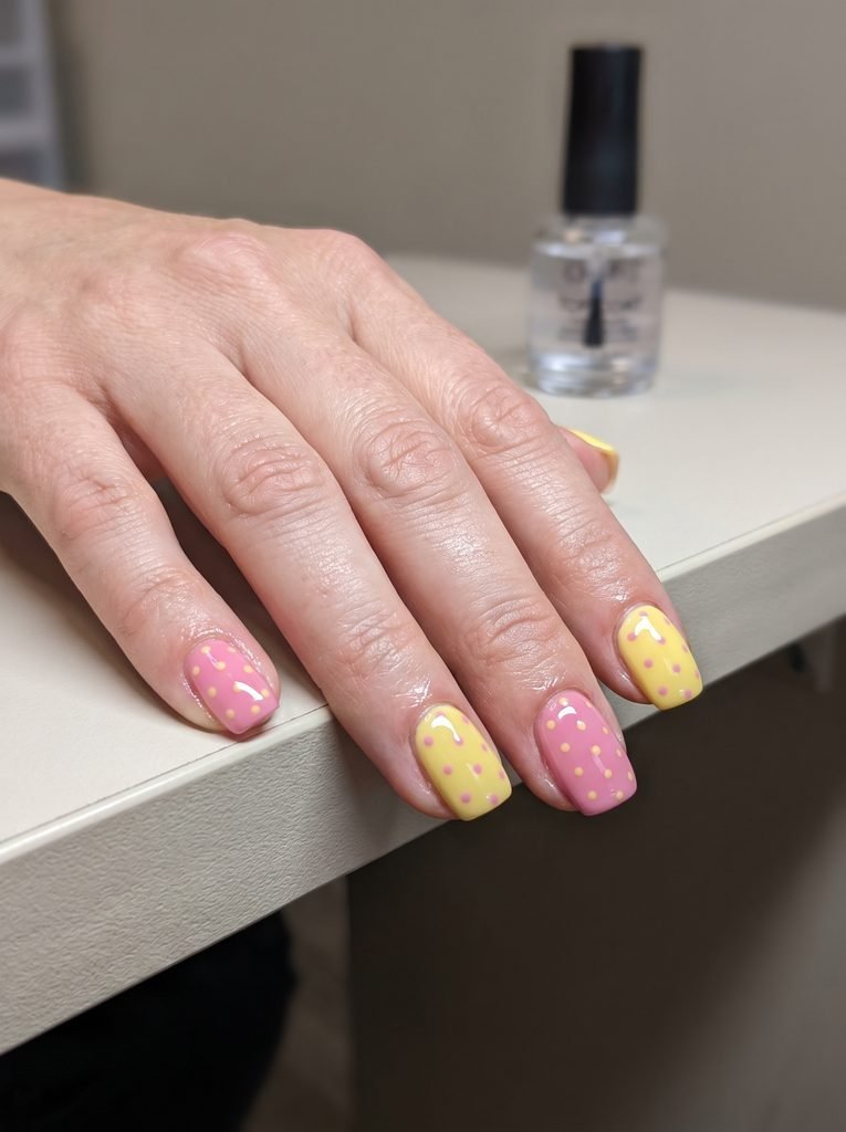 Pink yellow polka dot gel nails