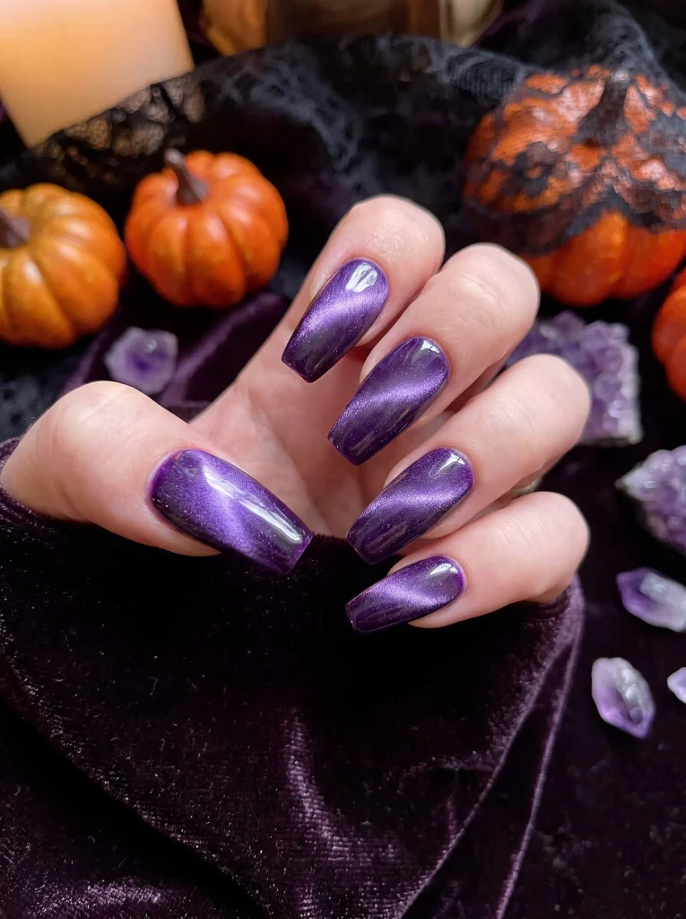 Purple cat eye Halloween nails