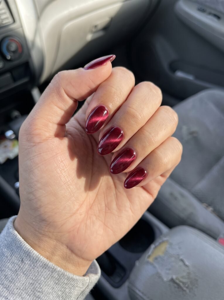 Red Cat Eye Almond Christmas Nails