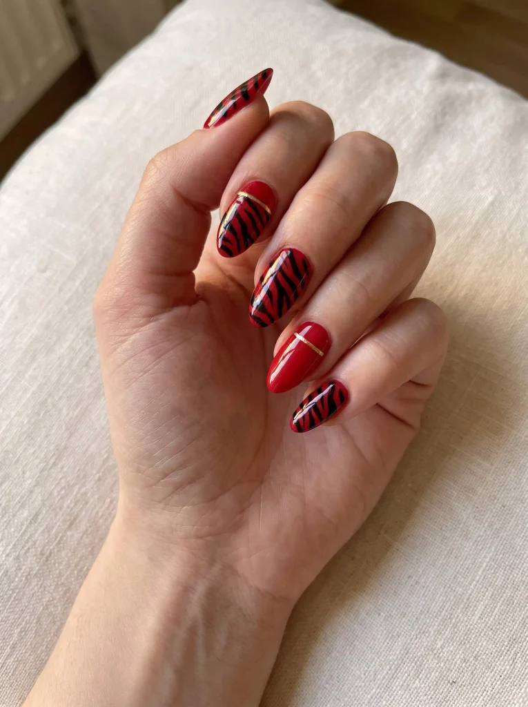 Red Zebra Gold Accent Nails
