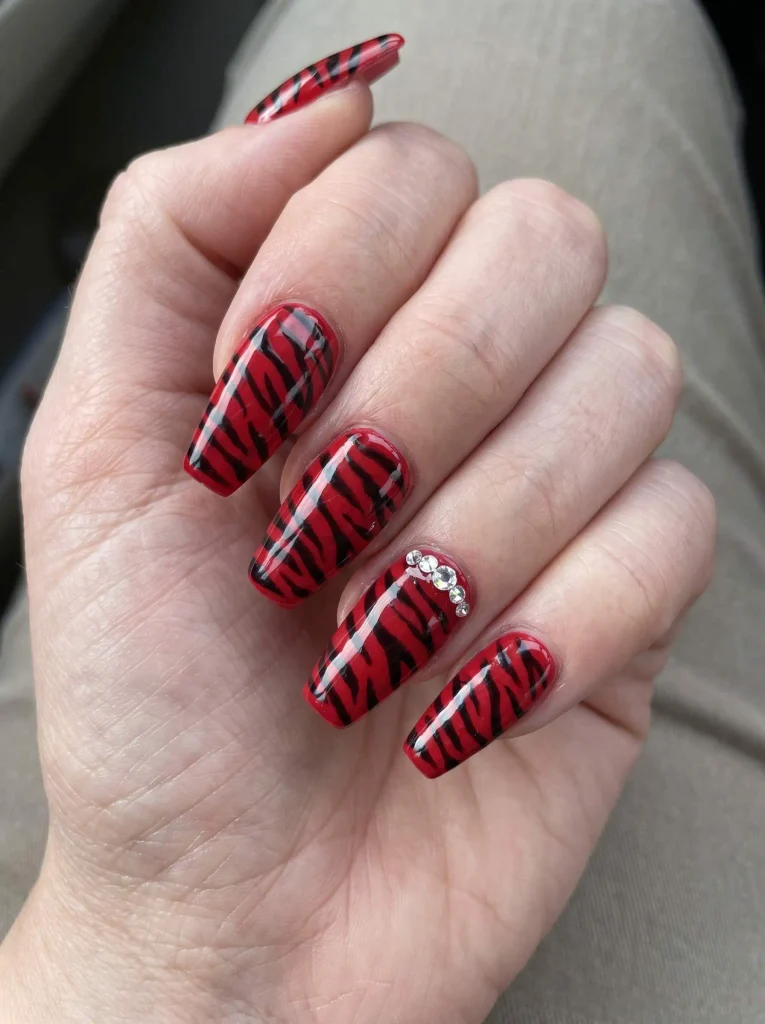 Red Zebra Rhinestone Accent Nails
