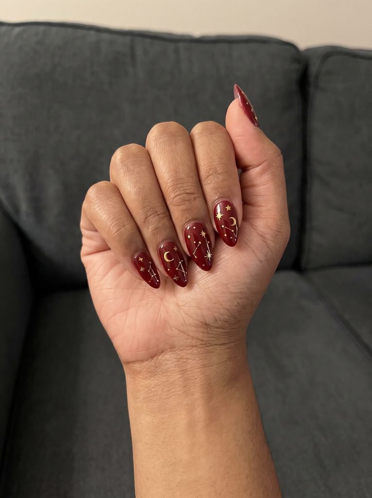 Red and Gold Celestial Almond Nails