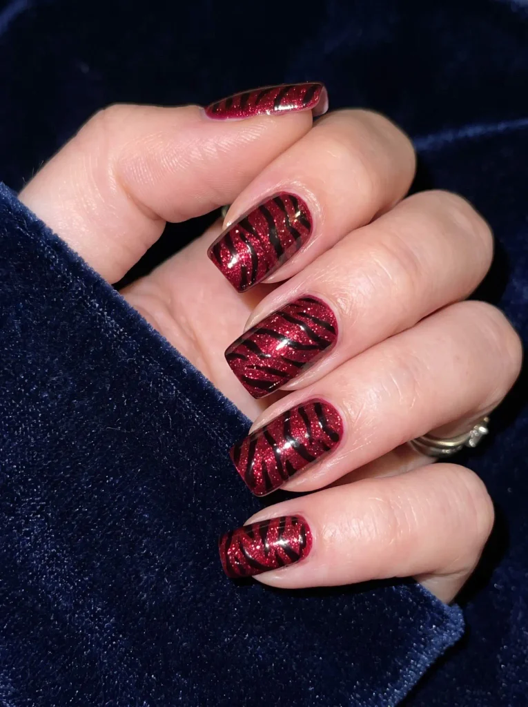 Sparkly Red Zebra Print Nails