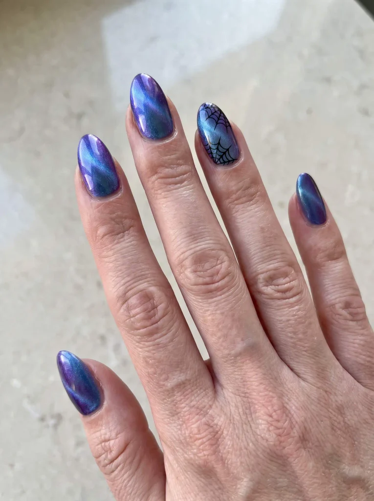 Spiderweb cat eye Halloween nails