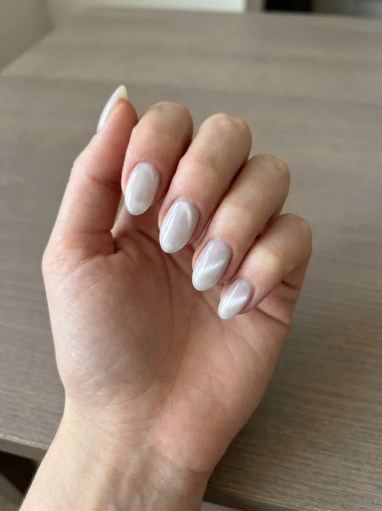 White cat eye Halloween nails