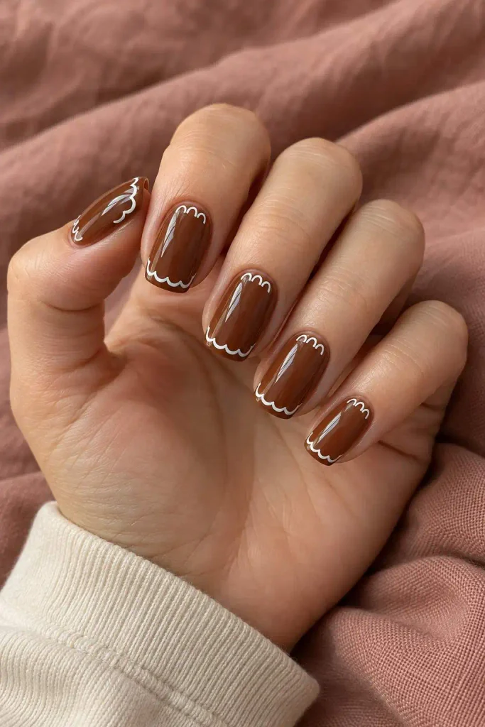 Gingerbread Nails With White Icing