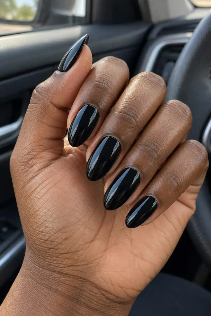 Glossy Black Almond Halloween Nails